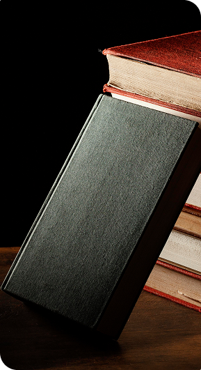books stack wooden table